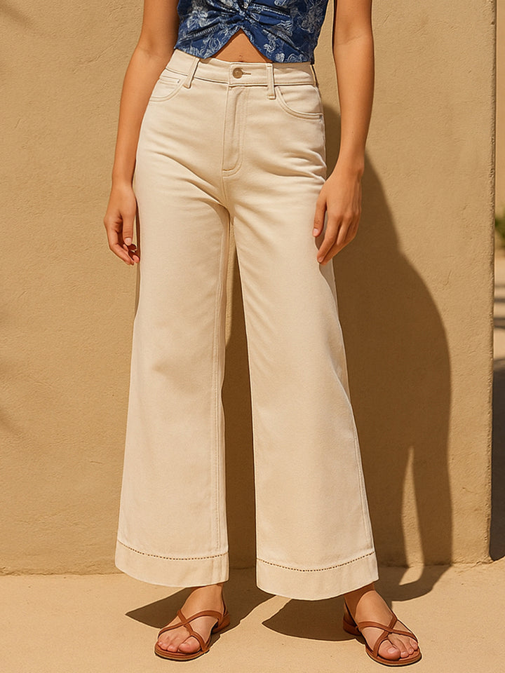 Jeans de pierna ancha de bordado de costura de contraste.